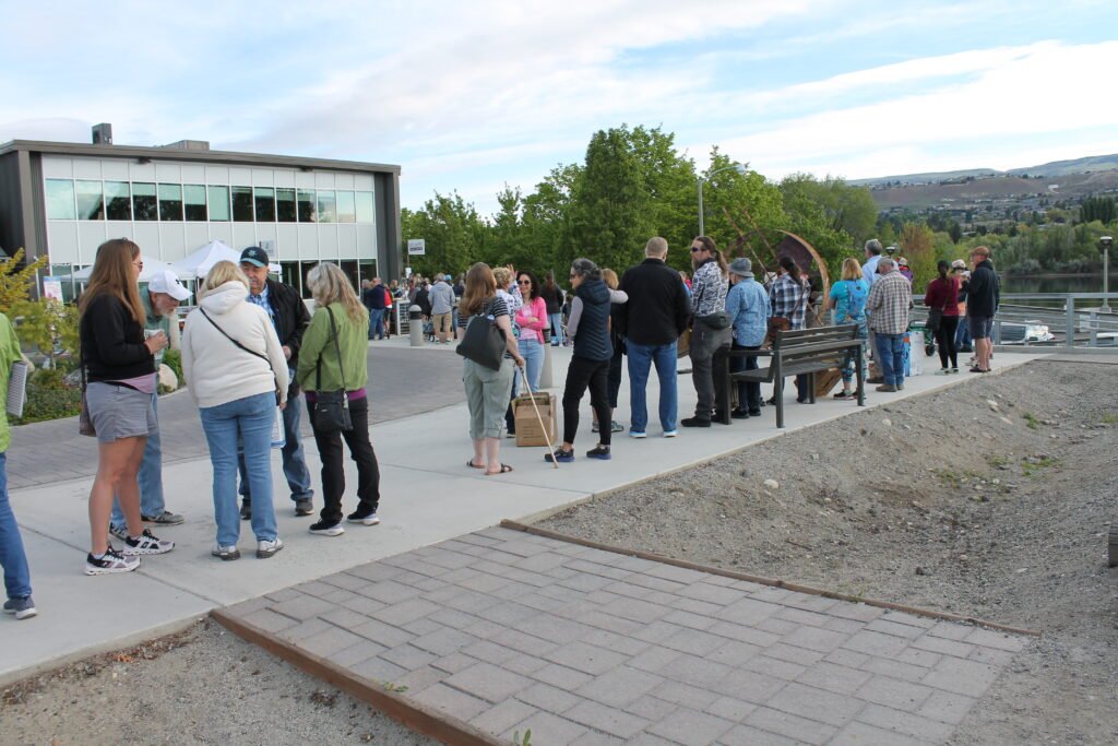 The line for the plant sale forms outside.